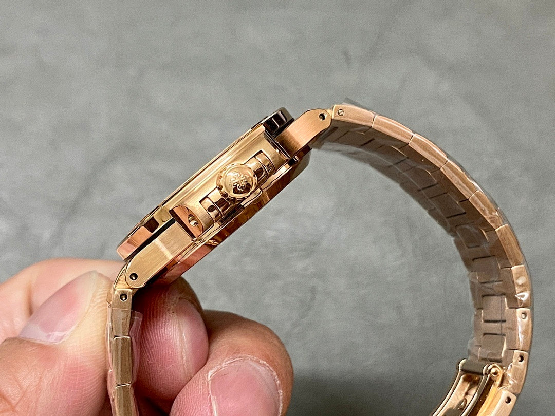 Gold-tone Patek Philippe wristwatch with hinged clasp, underside side view