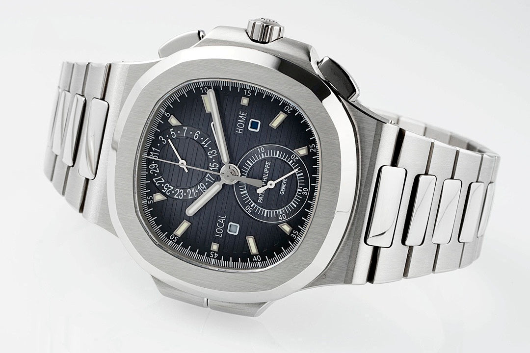 Stainless steel wristwatch with black dial, integrated bracelet, hour markers and subdials