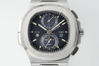 Stainless steel wristwatch front close-up with black dial and Patek Philippe logo