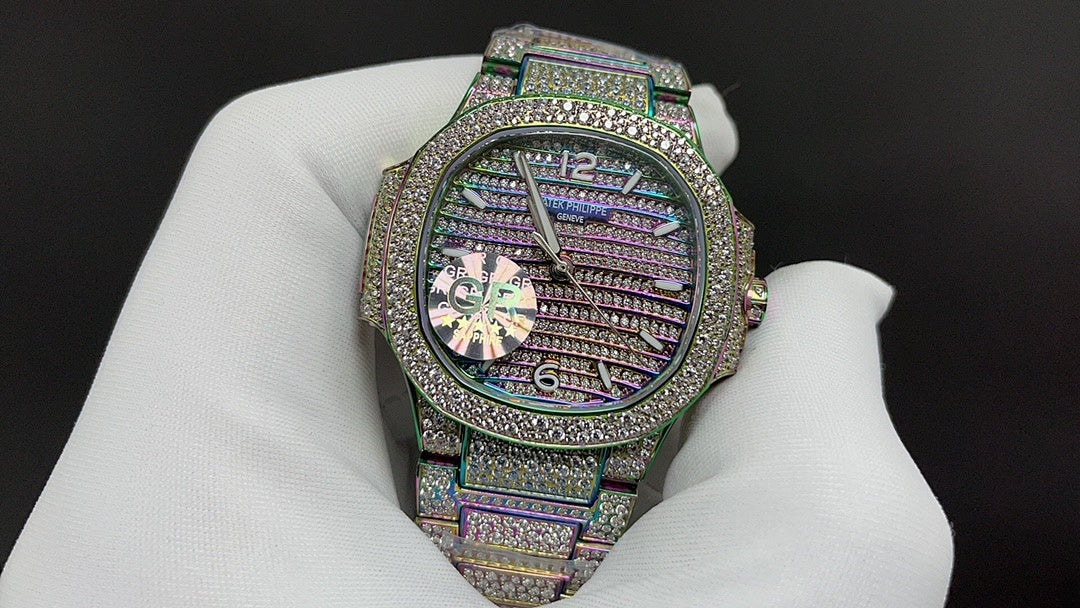 Jeweled wristwatch with iridescent bracelet and textured purple dial with diamond markers