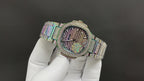 Jeweled wristwatch with iridescent bracelet and multicolor dial viewed at an angle
