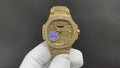 Patek Philippe gold-tone wristwatch with diamond bezel and multicolor dial detail