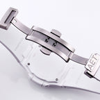 Patek Philippe watch case with white rubber strap and metal buckle clasp