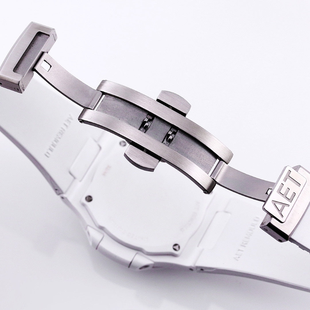 Patek Philippe watch case with white rubber strap and metal buckle clasp