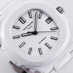Patek Philippe watch face close-up with white dial and bold dark hour markers