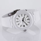 Patek Philippe watch with white dial, dark hour markers, and white strap