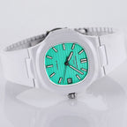 White sport watch with turquoise dial, black hour markers, and metal crown