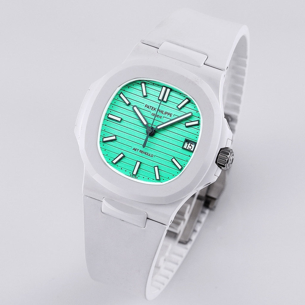 White sport watch with turquoise dial, black hour markers, and side crown