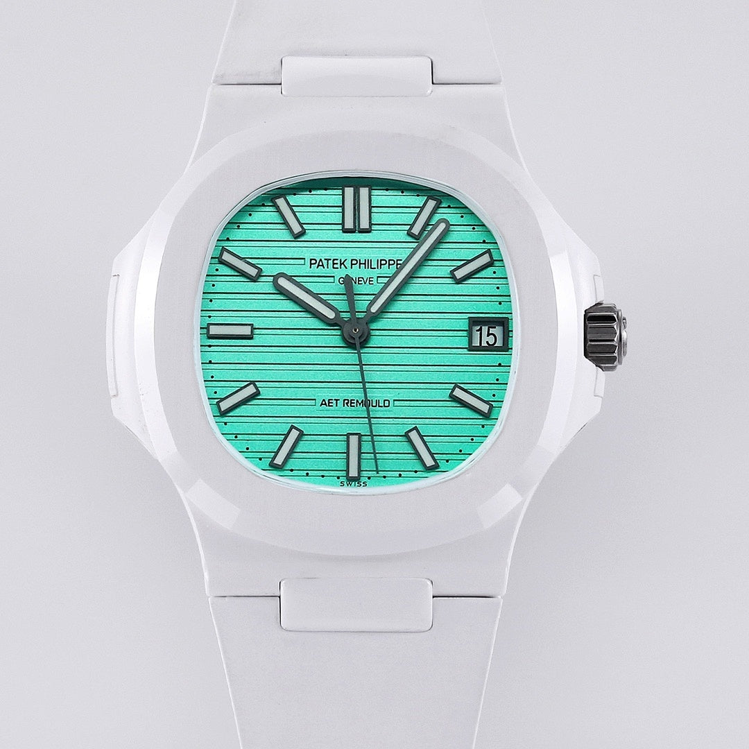 White sport watch with turquoise dial, black hands, and date window