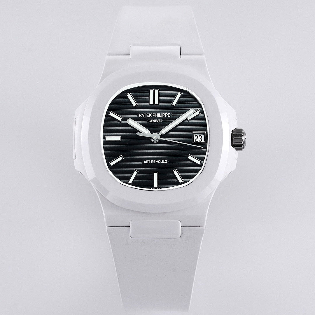 Patek Philippe watch, white rubber strap, black dial, date window at 23.