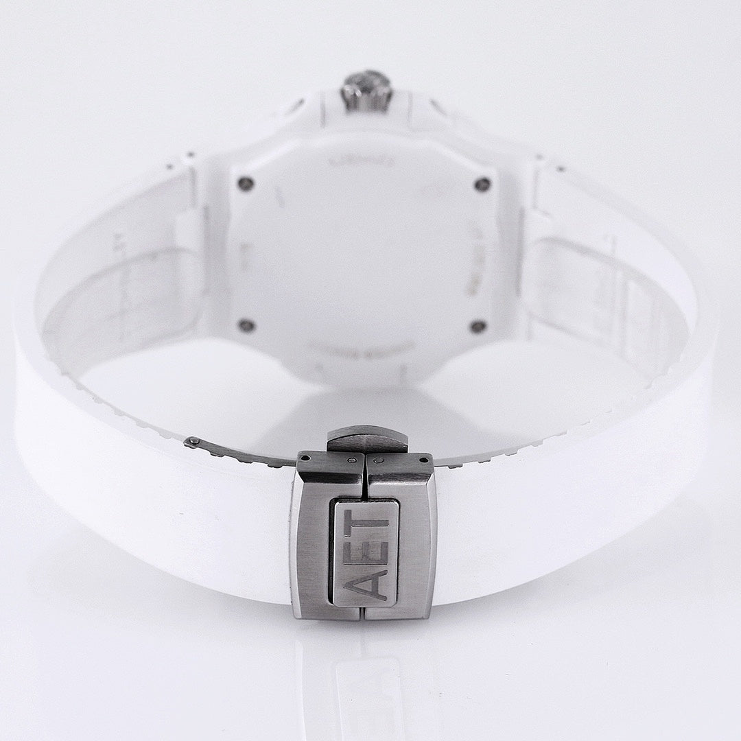 Patek Philippe watch, white rubber strap with metal clasp and caseback view.
