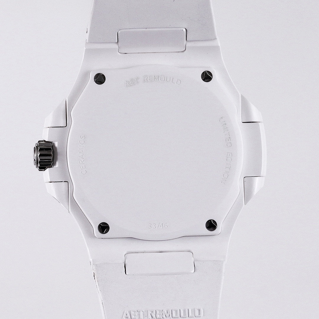 Patek Philippe watch caseback, white case with screws, white rubber strap.