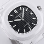 Patek Philippe watch dial close-up, black textured face with baton markers and date.
