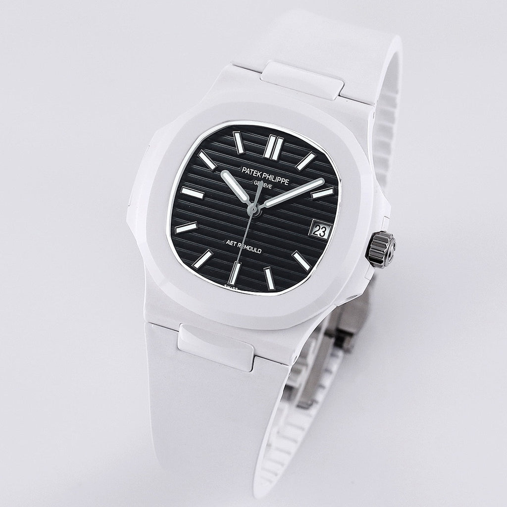 Patek Philippe watch 3/4 view, white rubber strap, black dial with date window.