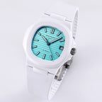 Patek Philippe watch, turquoise dial, white rubber strap, angled side view, baton hour markers