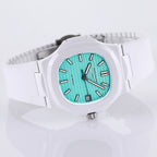 Patek Philippe watch, turquoise dial, white rubber strap, wide side view with visible bezel