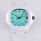 Patek Philippe watch, turquoise dial, white rubber strap, frontal view with baton hour markers