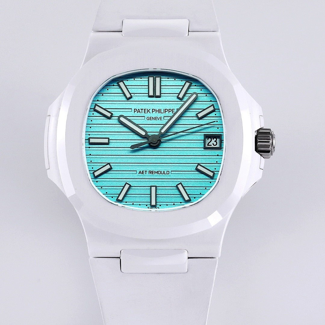 Patek Philippe watch, turquoise dial, white rubber strap, frontal view with baton hour markers