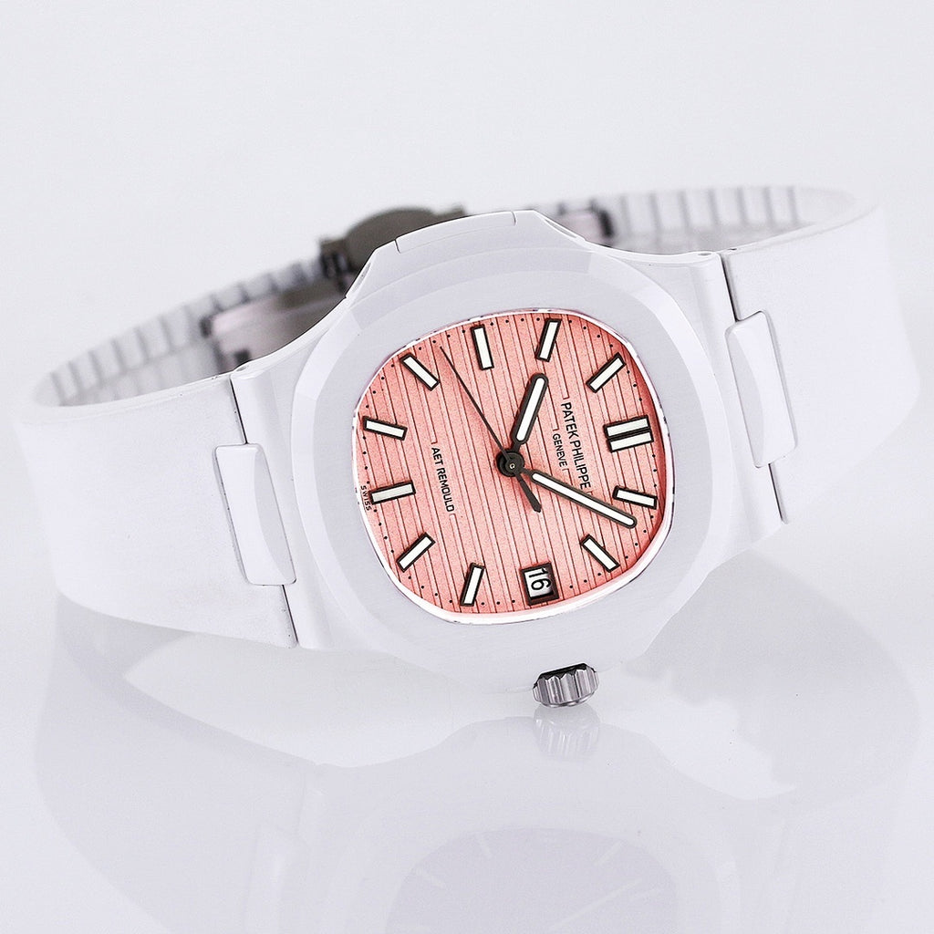 White rubber wristwatch with rose dial and black hands, angled view with crown