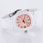 White rubber wristwatch with rose dial and black hands, angled view with crown