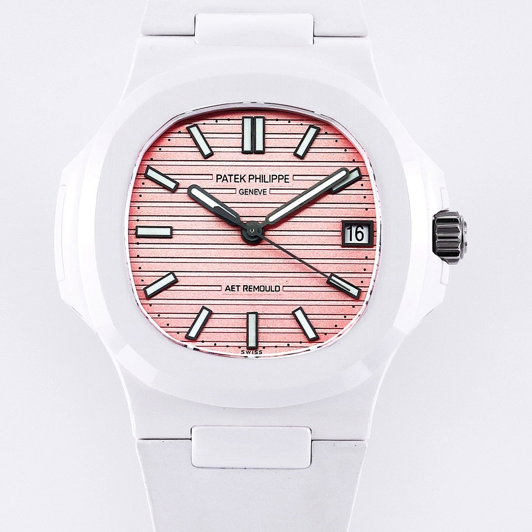 White rubber wristwatch with rose sunburst dial, black markers, date window at 3 o’clock