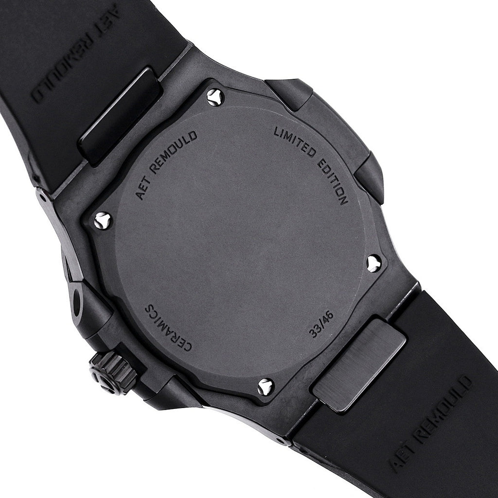 Patek Philippe limited edition watch case back, black housing with screws and text.