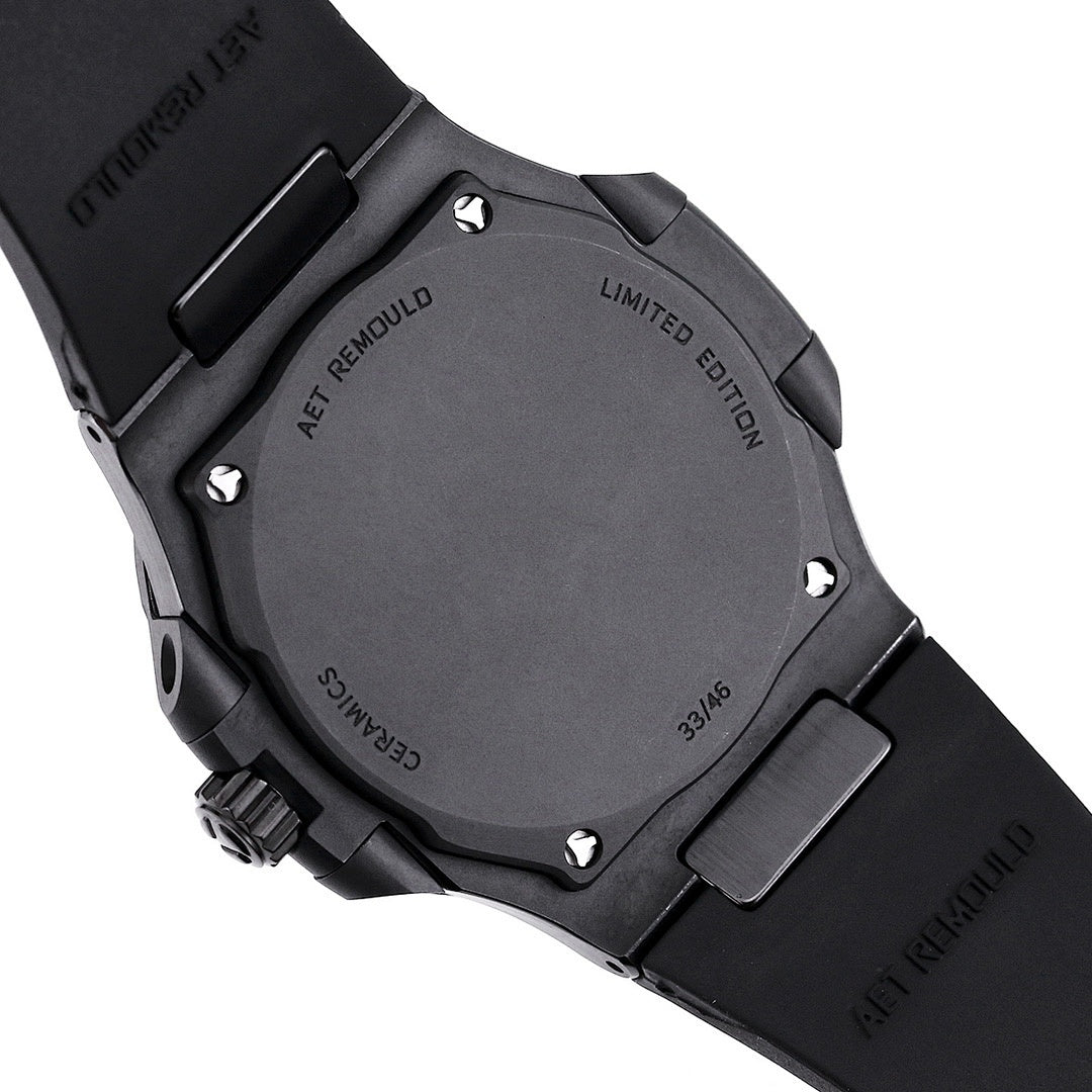 Patek Philippe limited edition watch case back, black housing with screws and text.
