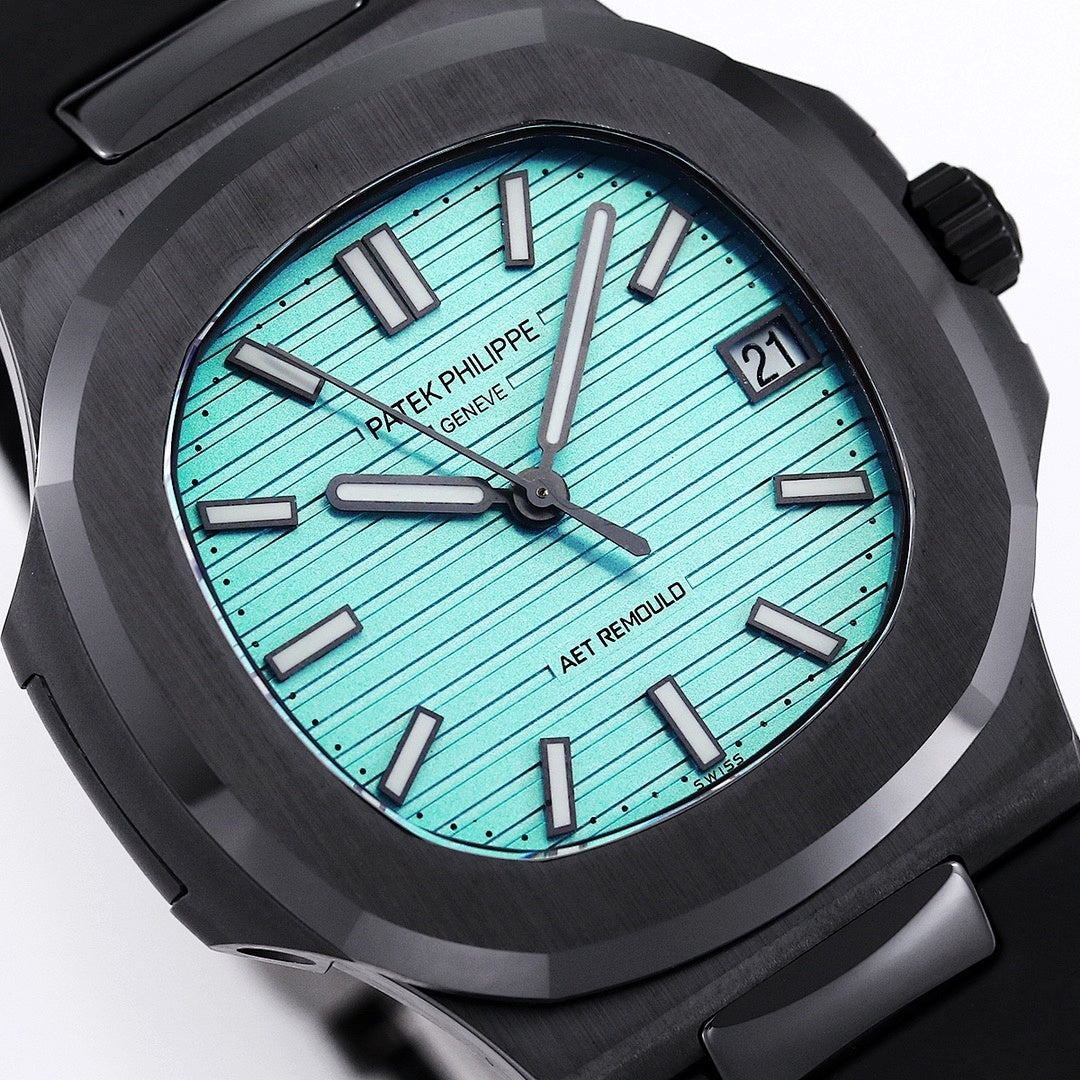 Patek Philippe watch close-up: turquoise dial with black hands and Roman hour markers.
