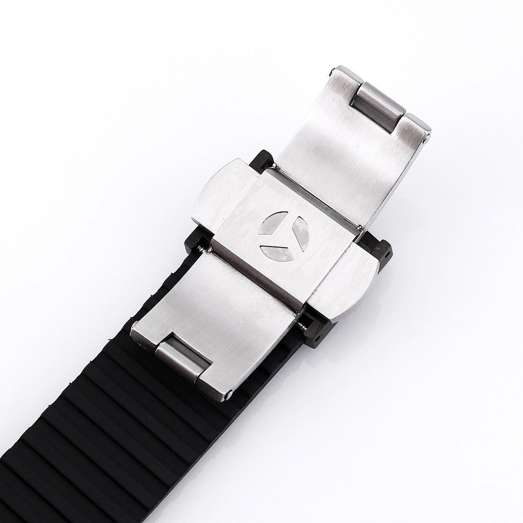 Patek Philippe watch with silver-toned clasp and black rubber strap