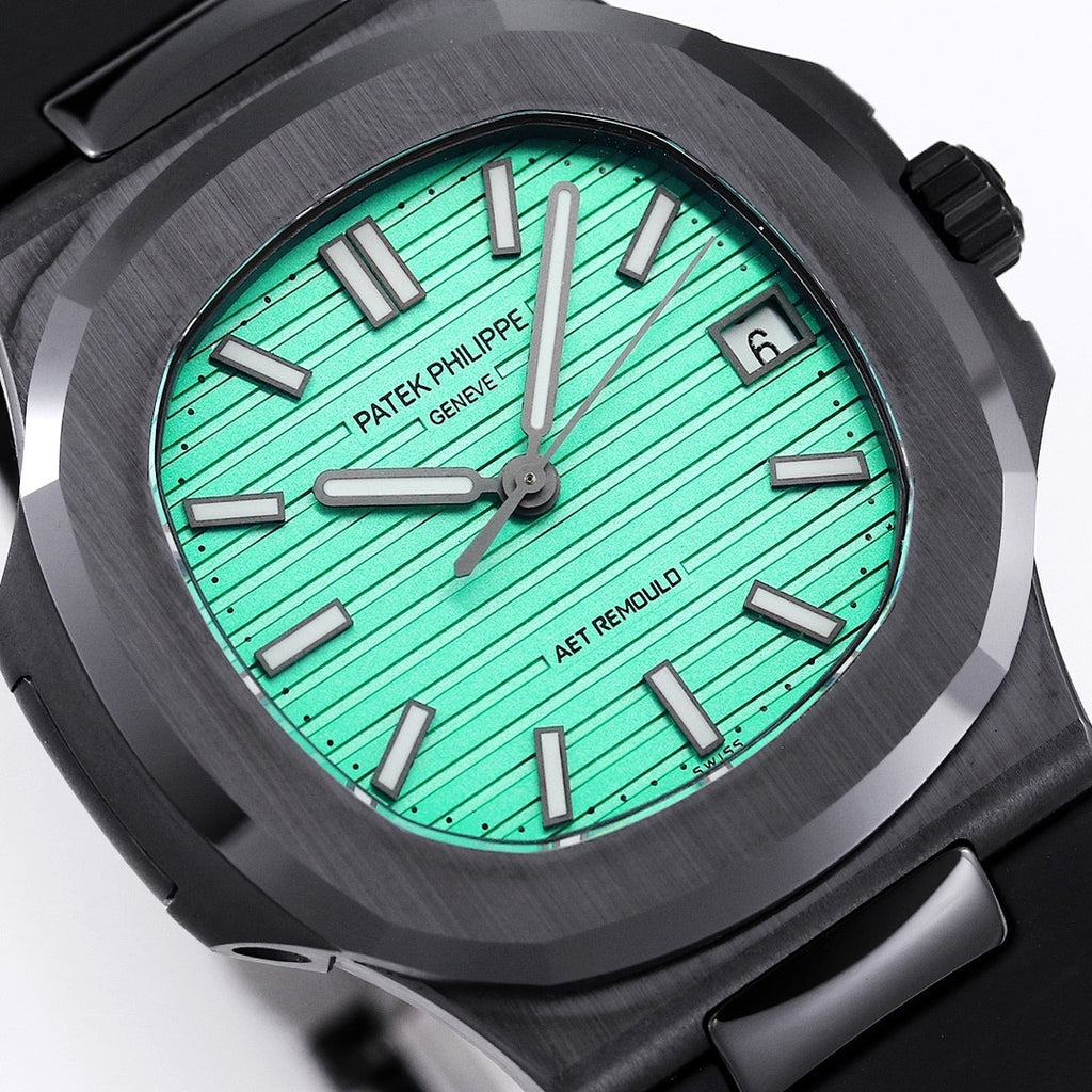 Patek Philippe watch dial close-up with green face, hour markers, and black case