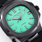 Patek Philippe watch dial close-up with green face, hour markers, and black case