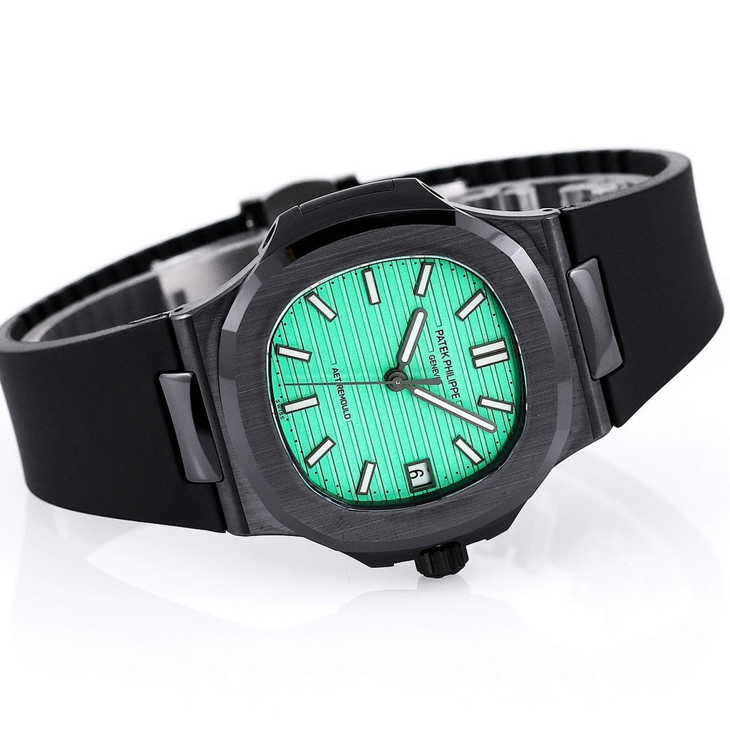 Patek Philippe watch on black strap with green dial and black bezel, angled view