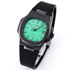 Patek Philippe watch with black case and green dial on black rubber strap, three-quarter