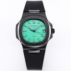 Patek Philippe watch, round black case with green dial and black rubber strap, straight-on