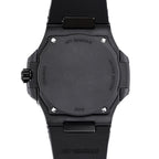 Black watch caseback with AET REMOULD marking and screws, black rubber strap