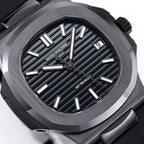 Close-up of black dial with raised silver indexes and AET REMOULD text