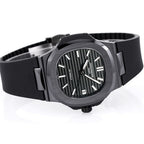 Black rubber strap watch with round case, silver indexes, three-quarter view