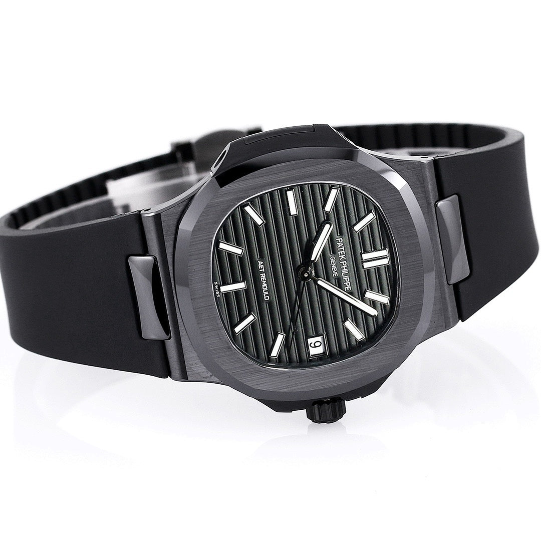 Black rubber strap watch with round case, silver indexes, three-quarter view