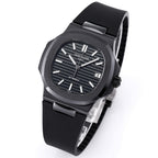 Three-quarter view of black sports watch with silver indexes and date window at 9