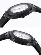 Black round wristwatch with white dial, shown from side with crown and pushers visible.