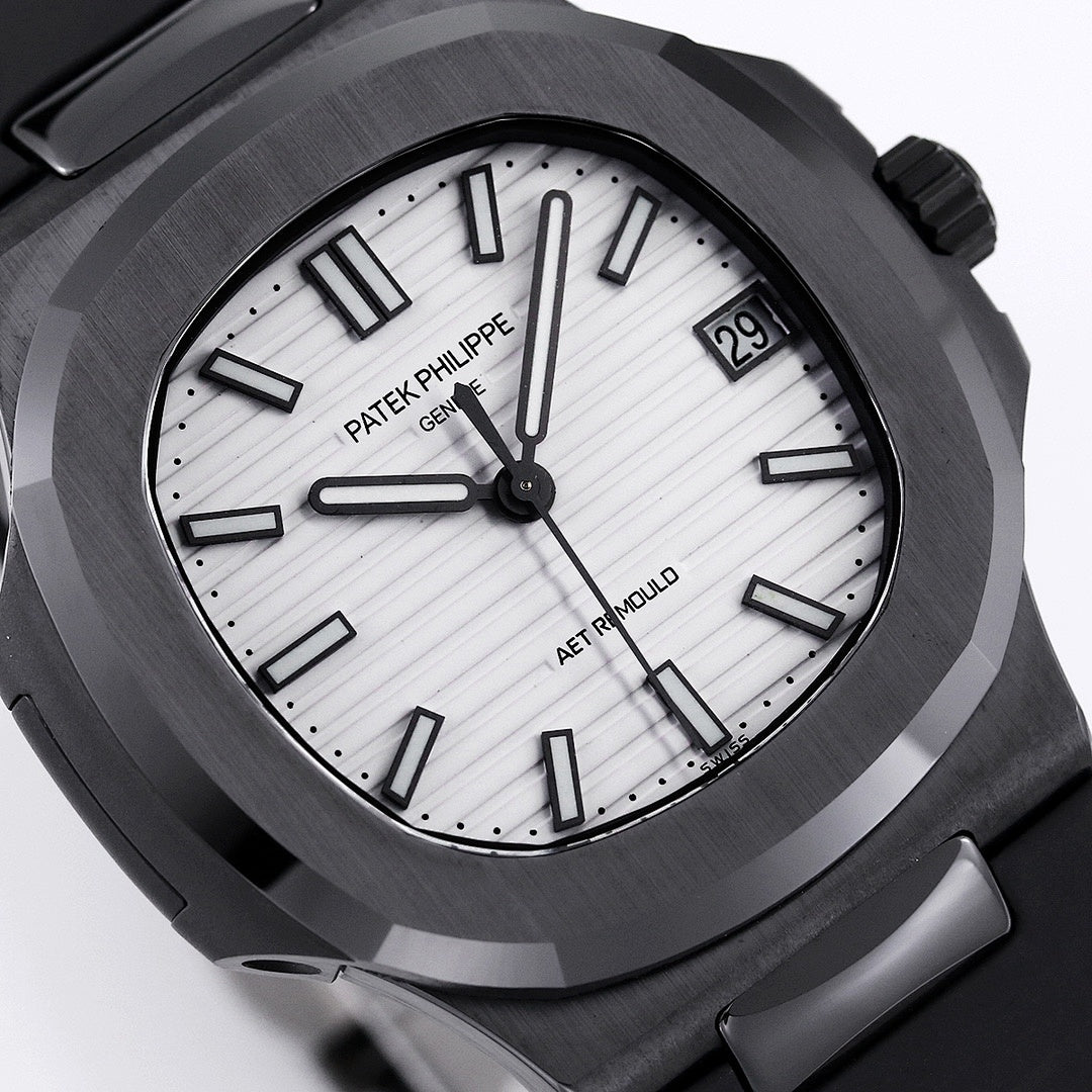 Black watch with white dial, bold hour markers, and date window at 3 o'clock.