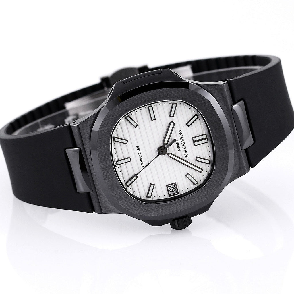 Black rubber wristwatch with white dial and date window, viewed at an angle.