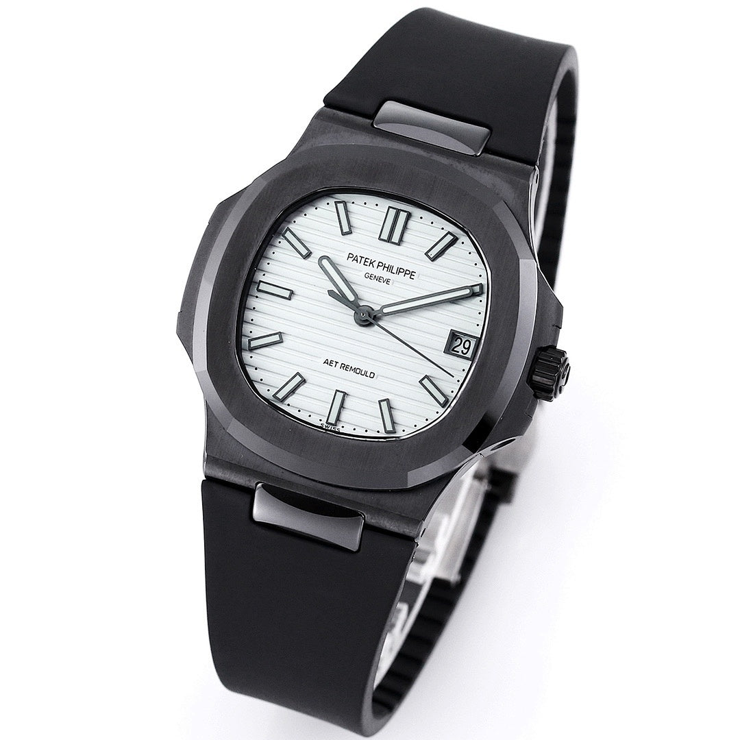 Black rubber wristwatch with white dial, date window at 3, and side crown detail.