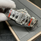 Stainless steel watch bracelet links close-up with protective film on the band