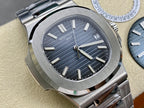 Patek Philippe wristwatch angled view with dark blue dial, baton markers, steel bracelet