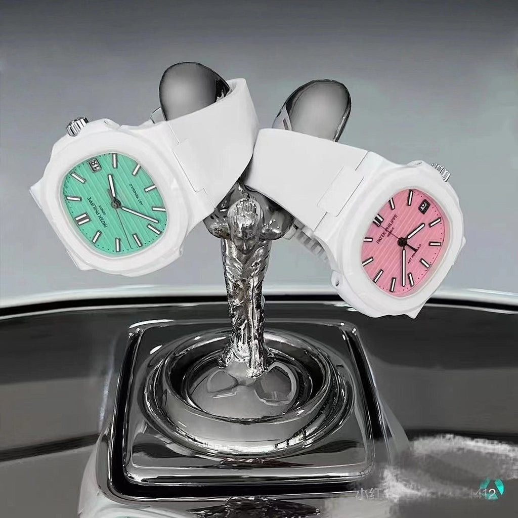 White sport watches with green and pink dials, silicone straps, displayed with water pouring