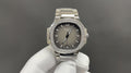 Patek Philippe watch with gray dial, diamond bezel, and stainless steel bracelet