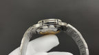 Patek Philippe watch case back with stainless steel bracelet links