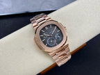 Rose gold-tone wristwatch with blue dial and metal bracelet, top angled view.