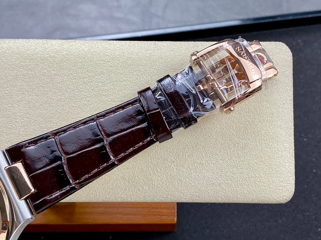 Patek Philippe watch leather strap with rose-gold buckle hardware in dark brown